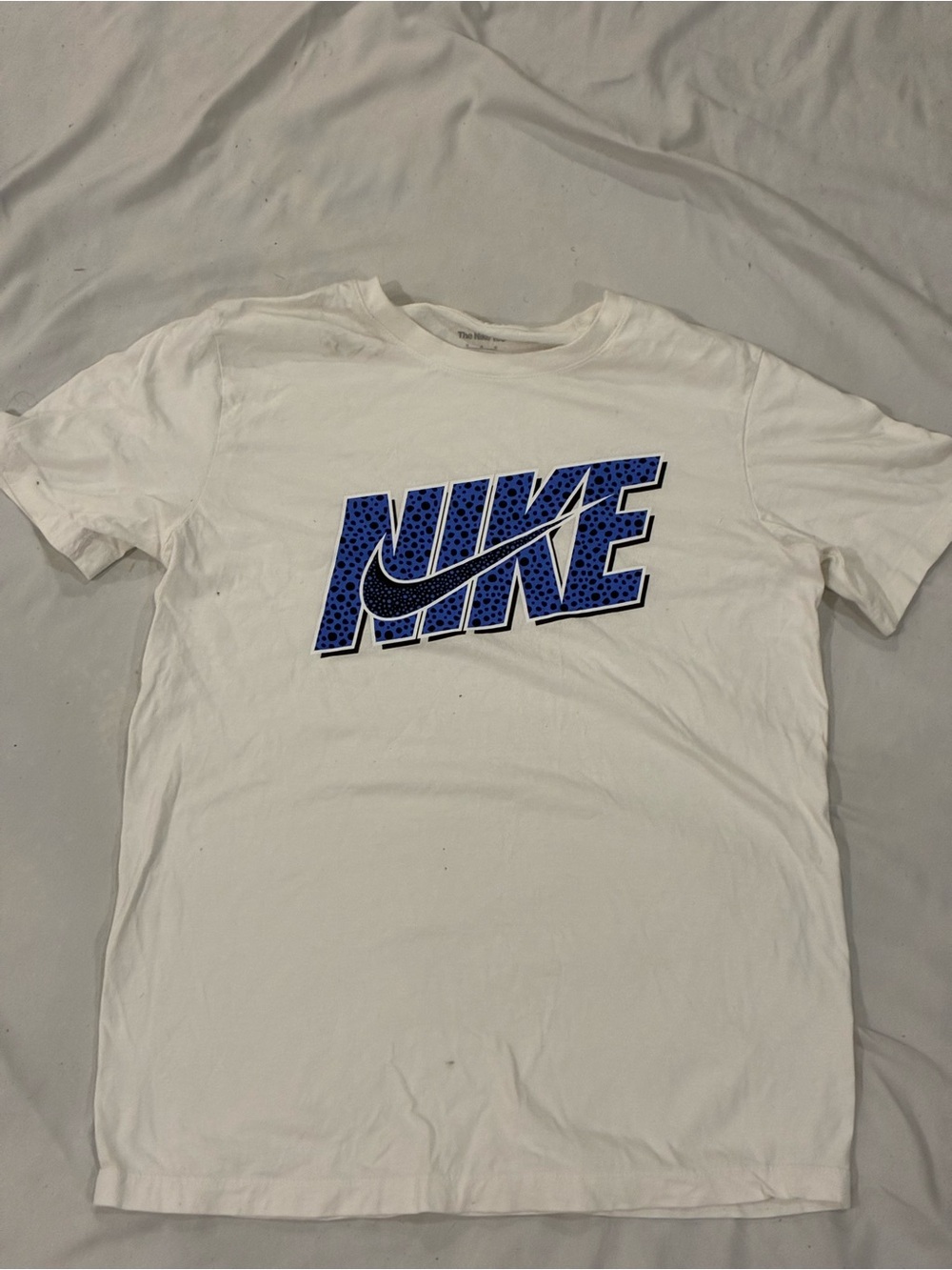 Nike Short Sleeve Tee in White with Blue Graphic Logo